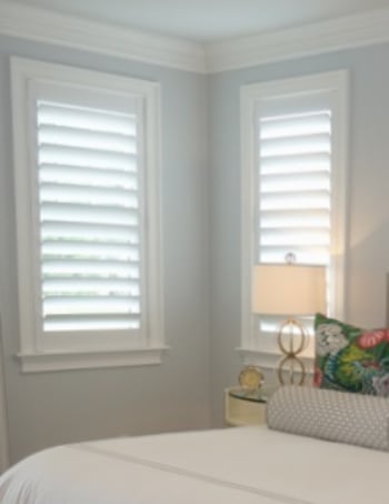 White plantation shutters with hidden tilt rods in Boston